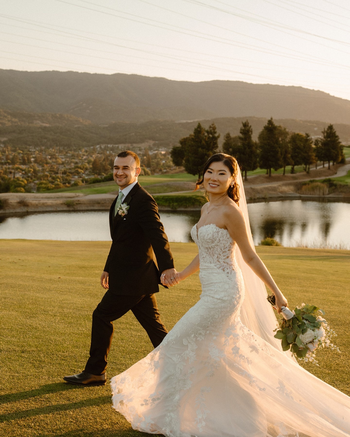 Golden hour portrait of the bride and groom celebrating at one of the best wedding venues in San Francisco Bay Area.