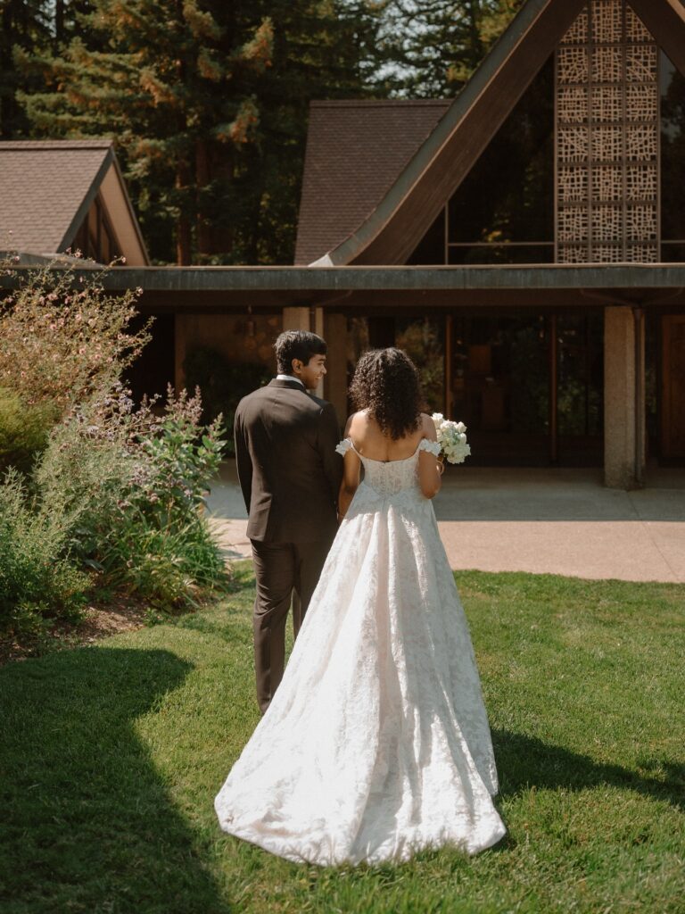 Bride and groom walking  at a small wedding venue San Francisco couples love for intimate celebrations surrounded by redwoods.