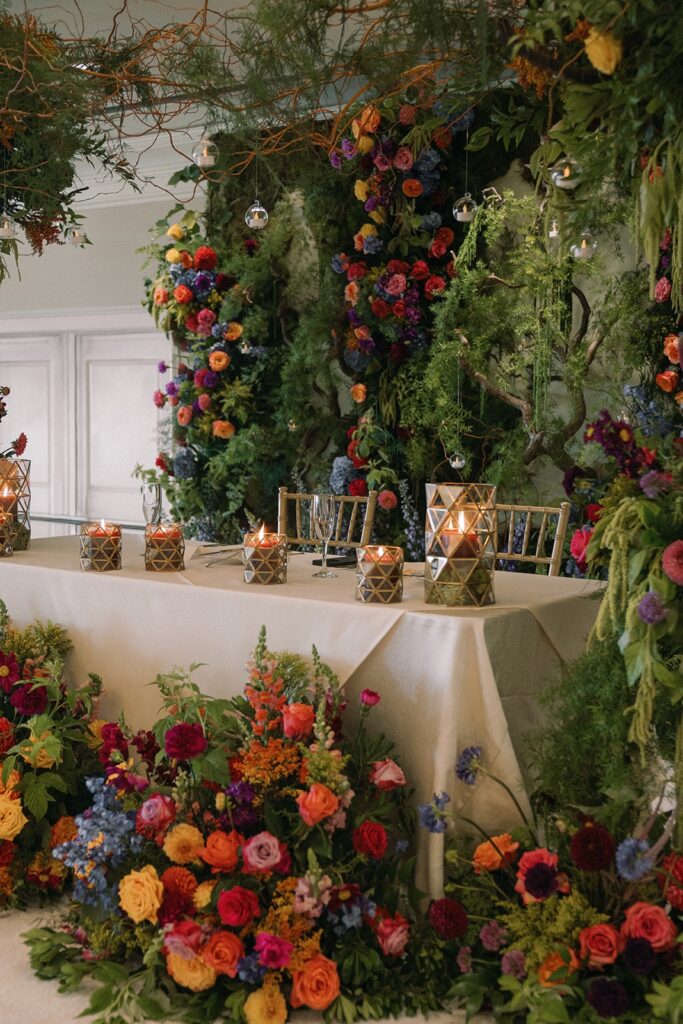 A Newcastle wedding is decorated with elaborate flowers of orange, red, pink, and blue