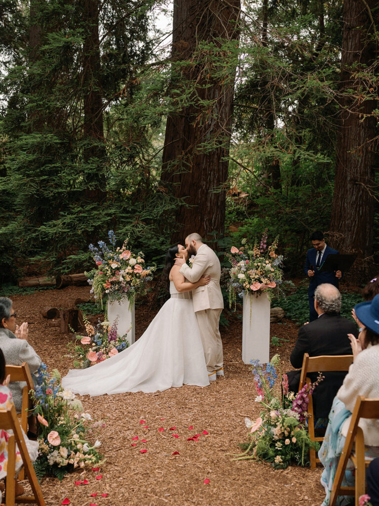 bride and groom kissing at their ceremony at an intimate wedding location in San Francisco, Golden Gate Park